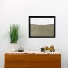 black painted wood frame ant farm hanging on wall